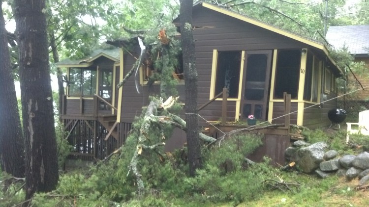 A storm on Wednesday toppled trees onto camps on the Belgrade Lakes area.