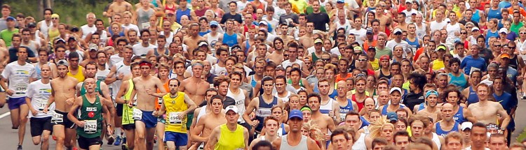 Runners leave the starting line during the 17th annual TD Beach to Beacon 10K in Cape Elizabeth on Aug. 2, 2014. Gregory Rec/Staff Photographer