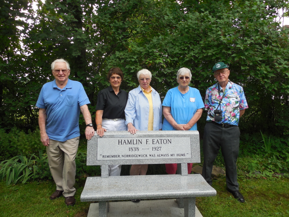 Eaton, Norridgewock High School alumni officers during the dedication of the Hamlin F. Eaton bench, from left, are Harold Dunlap, president; Donna Mickewich, secretary; Marilyn Dunlap, historian; Catherine Edgerly, vice president; Eastman Wilder, treasurer.