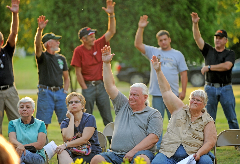 Benton residents vote down a fireworks ordinance that would have restricted the use to Independence Day only during a special town meeting at the gazebo in Benton on Monday.