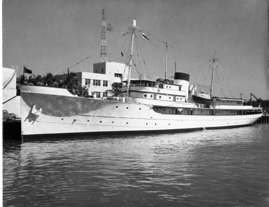 Above, the USS Williamsburg sits at a shipyard in La Spezia, Italy, where it has been stored for 20 years. At left, the yacht in better times during President Harry S. Truman’s vacation in Florida. 
 Photos courtesy David Seal and Harry S. Truman Library & Museum