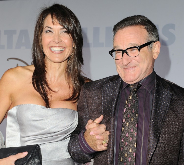 Robin Williams is shown with his wife, Susan Schneider, who said Thursday that the actor suffered from Parkinson’s disease.