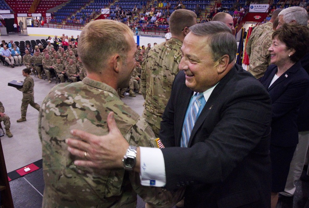 Maine Governor Paul Lepage thanks members of Maine’s 133rd Engineer Battalion, recently back from deployment in Afghanastan, during a ceremony at the Colisee in Lewiston on Sunday.