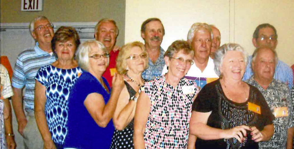 In front from left: Jean Violette Doslie, Ellen Rood Bolin, Sherrill, Poulliot Bouchard, Joyce Bragg Patrick, Steve Lord and Judy Smith Daviau. Middle row from left: Valerie Veilleux Fisher and Wayne Fournier. In back from left: Doug Ward, Dve Reid, Tim Paul, Carl Fitzgerald, Roger Paradis and Don Pelletier.