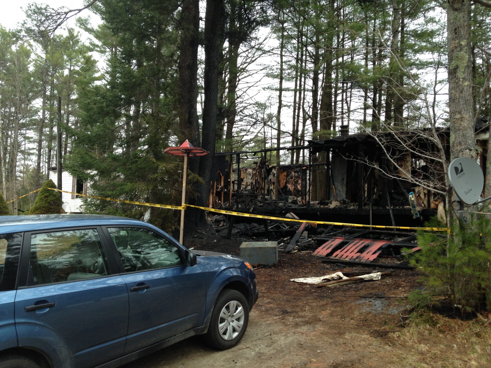 $ID/[No paragraph style]:Charles Reed has been charged with setting the April 30 fire that destroyed his homen in Monmouth.