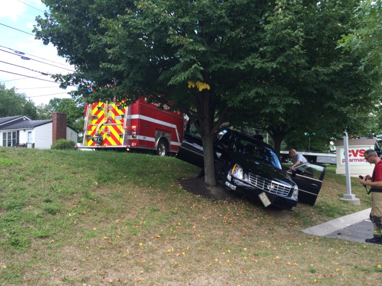 A woman intending to turn right off of Merryfield Avenue in Waterville instead crashed into a tree outside CVS on Friday according to police.