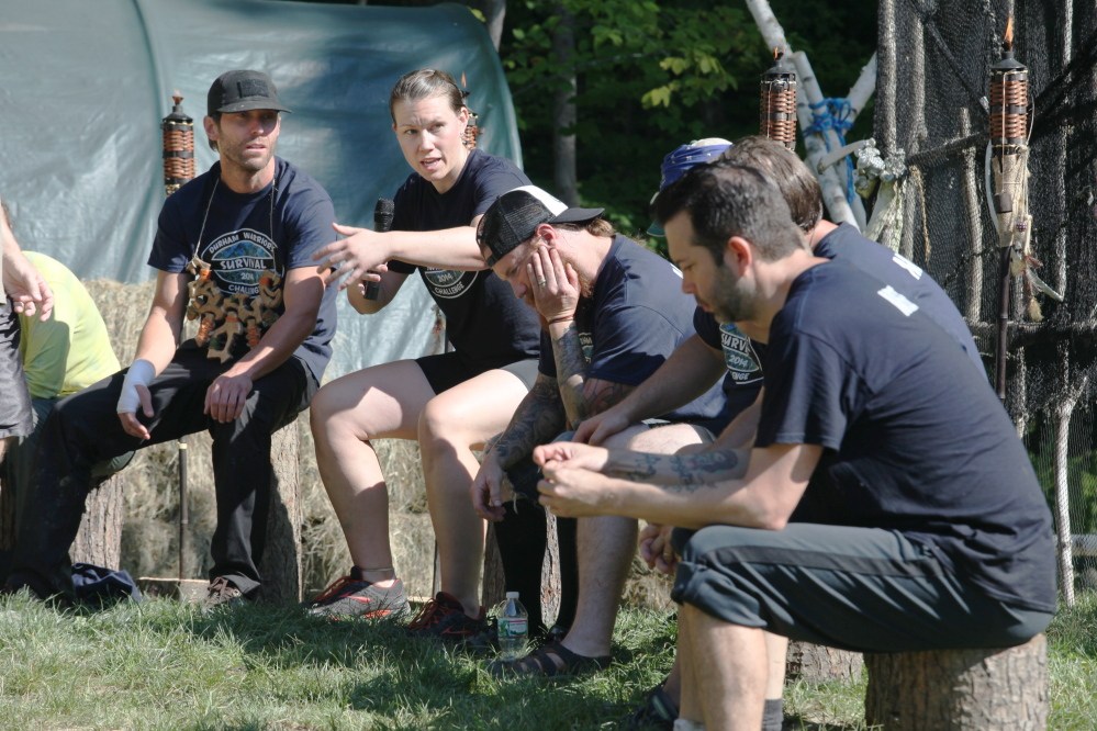 Rebecca Brakeley, of Portland, speaks Sunday during a Tribal Council as part of the 2nd annual Durham Warriors Survival Challenge in Durham. The fundraiser is put on by “Survivor” winner Bob Crowley.