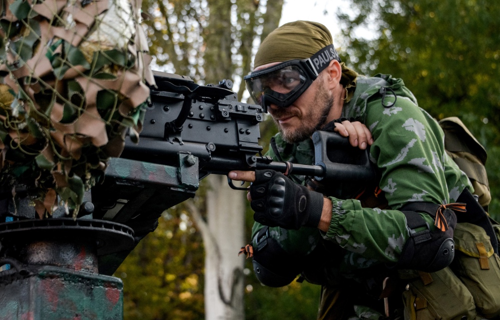 A Pro-Russian rebel prepares arms for the the assault on the positions of Ukrainian army in Donetsk airport, eastern Ukraine, Sunday.