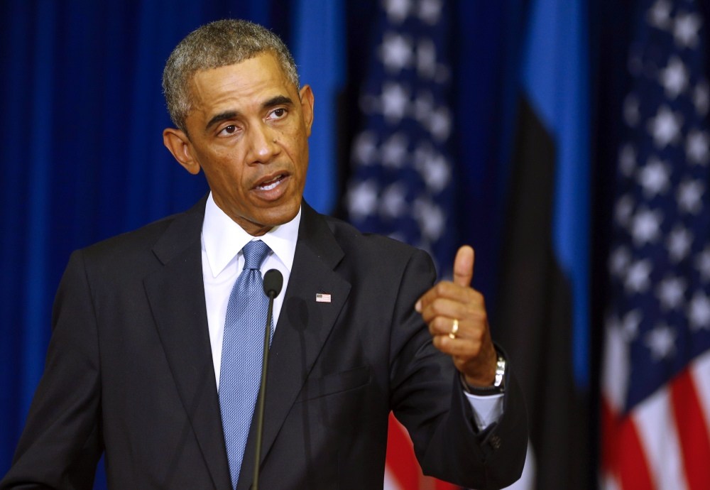 U.S. President Barack Obama gestures during his and Estonian President Toomas Hendrik Ilves’s news conference at the Bank of Estonia in Tallinn, Estonia, Wednesday.