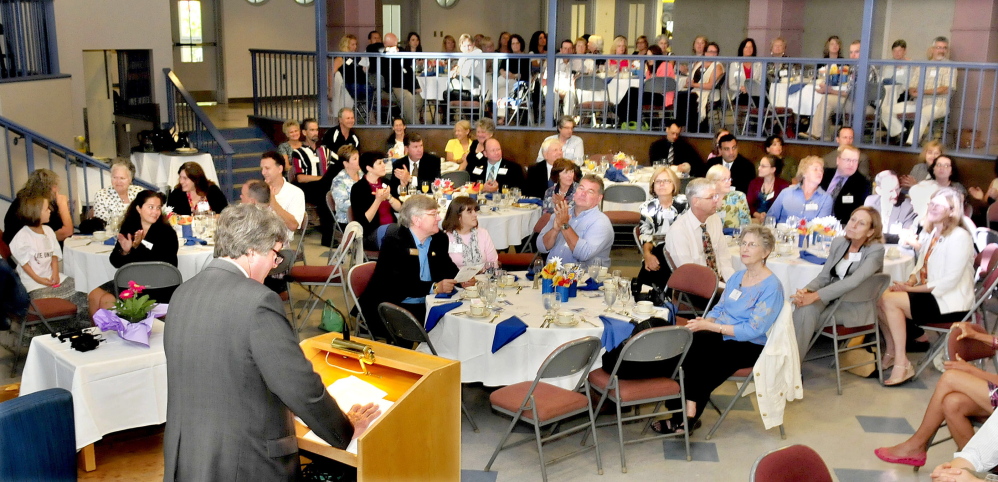 United Way of Mid-Maine Campaign Chairman Scott Bullock addresses representatives of businesses and organizations during a 2014 Campaign Kick Off event in Waterville on Wednesday