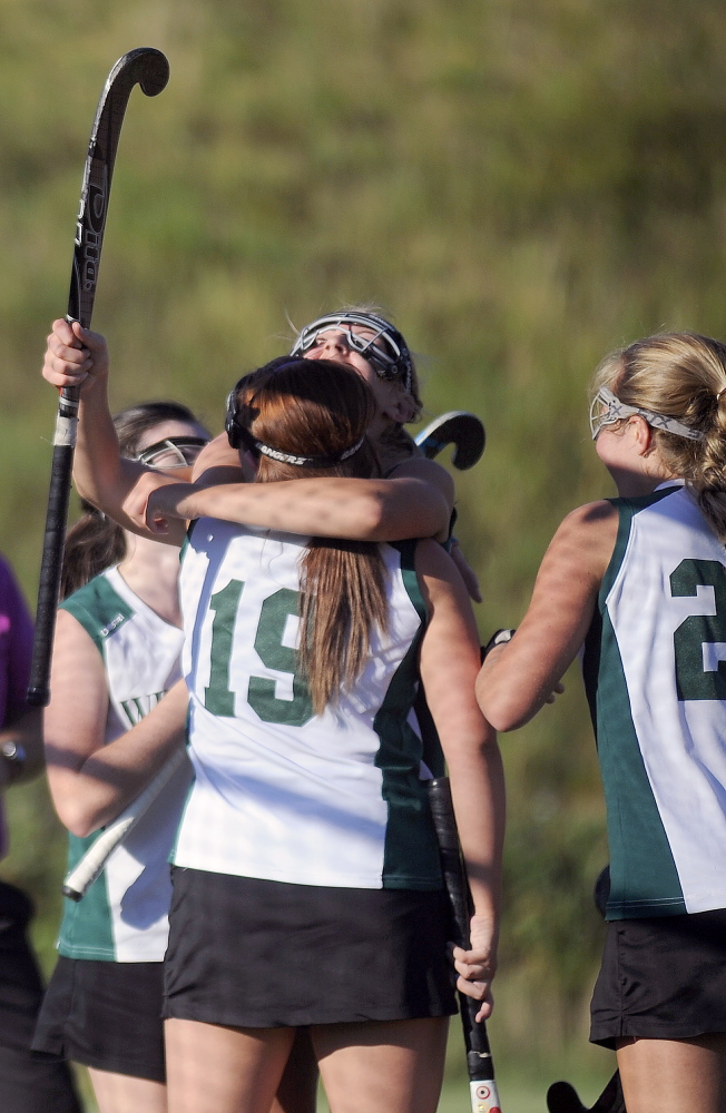 Winthrop’s Sarah Spahr raises her stick in the air after scoring the winning goal against Dirigo on Wednesday in Winthrop.
