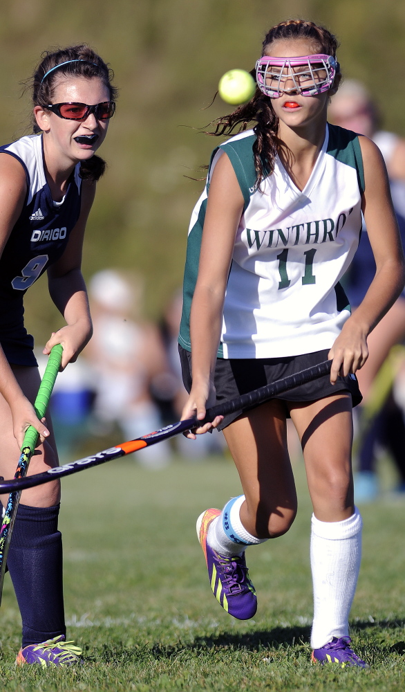 Winthrop’s Kinli Dibiase, right, chases the ball after knocking it away from Dirigo’s Amber Ferris on Wednesday in Winthrop.