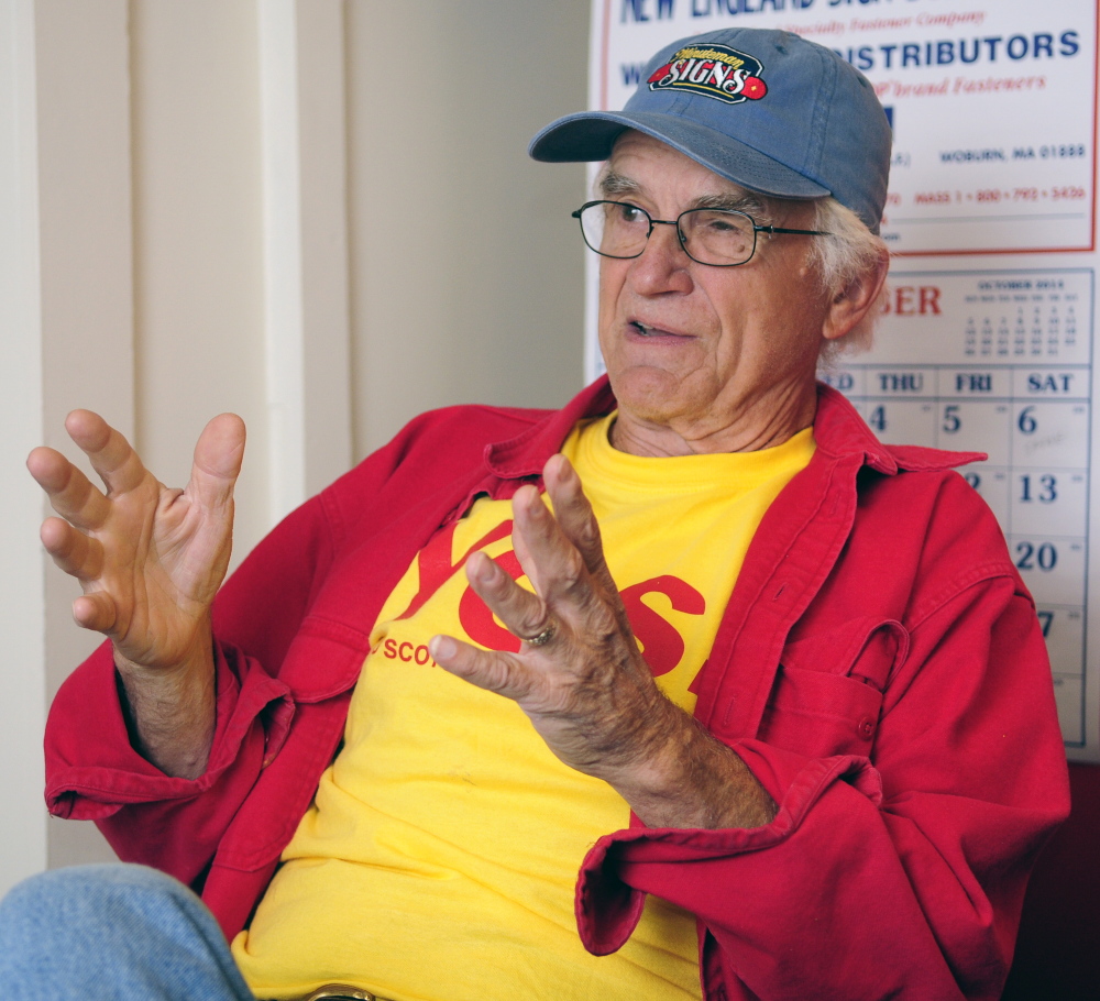 Bill McKeen talks about the Scottish independence vote during an interview on Tuesday at his business, Minuteman Signs in Augusta.