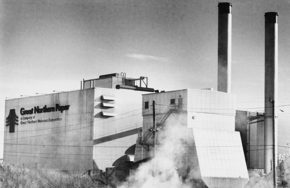 At top, a storage facility was mostly empty in July at the East Millinocket mill, which made newsprint and paper for the book publishing industry but had been shut down in January, resulting in the layoff of more than 200 workers. Above, the mill was producing tons of paper in 1989 when it was owned by Great Northern Nekoosa Co. Global competition eventually eroded Maine paper company profits and caused the industry to contract.