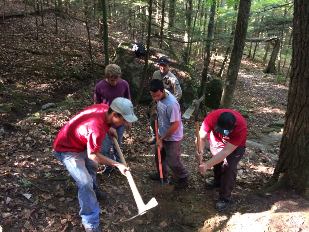 Work to clear and reshape a trail that the maintenance crew at Lake George Regional Park would never have the time to perform was accomplished in little more than an hour Friday, as students at Marti Stevens Learning Center used their community service time to help restore user-worn Pinnacle Trail.