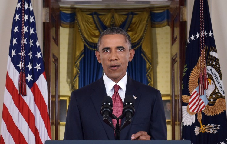 President Obama addresses the nation from Cross Hall in the White House on Wednesday night. In a major reversal, Obama ordered the United States into a broad military campaign to "degrade and ultimately destroy" militants in two volatile Middle East nations, authorizing airstrikes inside Syria for the first time, and an expansion of strikes in Iraq. 
