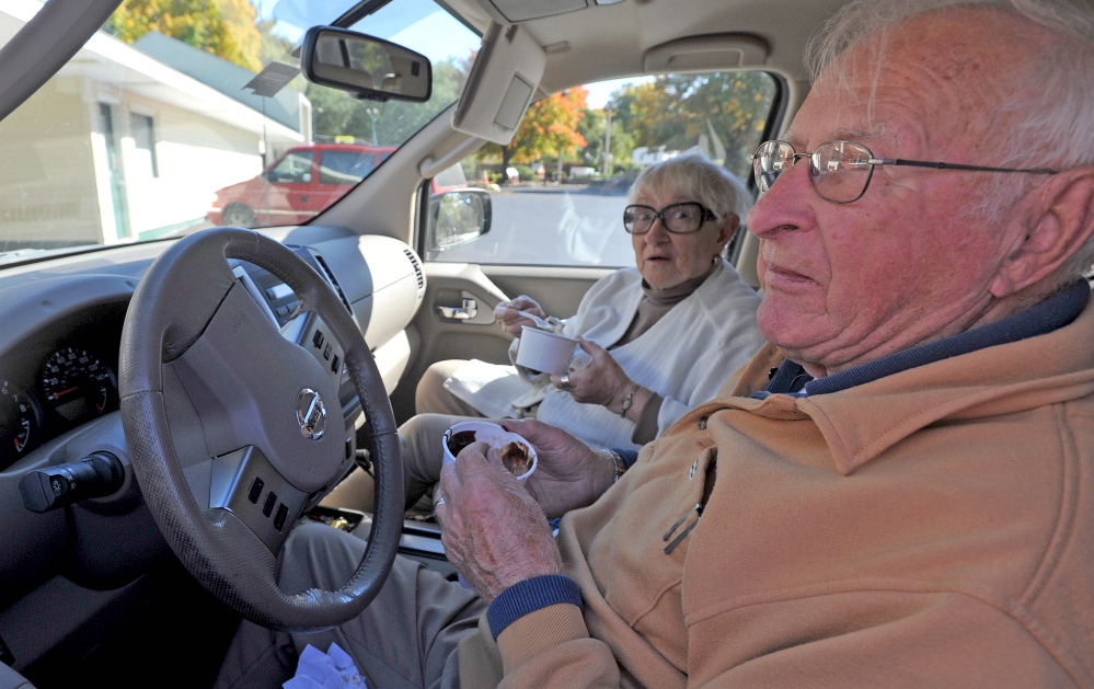 Lew and Katy Ouilette enjoy a cup of ice cream Thursday at Gifford’s Ice Cream in Waterville. Gifford’s recently was honored as producing the best chocolate ice cream entered in a contest conducted by a Wisconsin trade group.