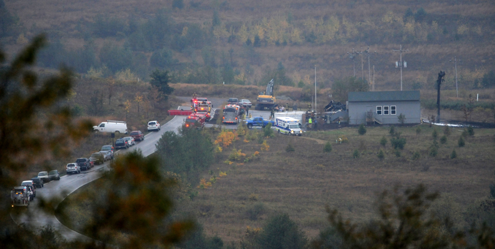 Emergency personnel respond to a structure fire that leveled administrative buildings at the Flight 93 National Memorial near Shanksville, PA., Friday.