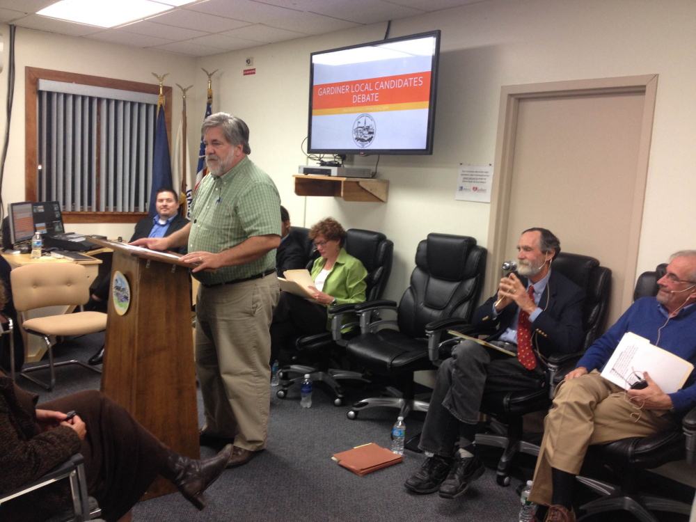 Mayor Thomas Harnett speaks Tuesday at the city of Gardiner’s candidate forum in City Hall.