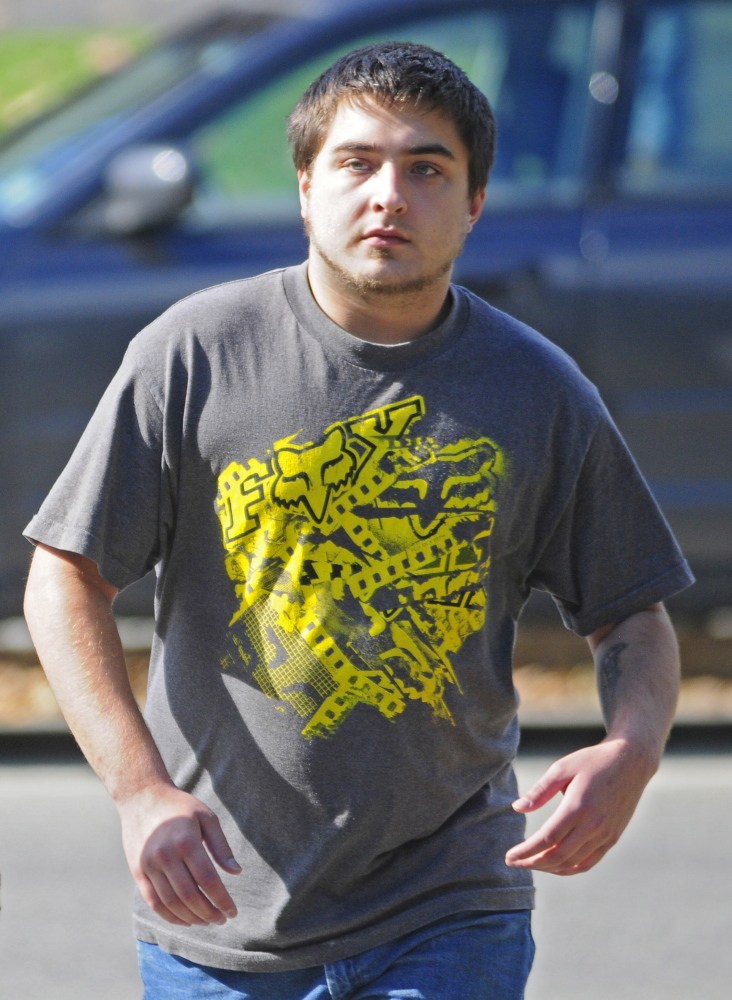 Kevin Peaslee walks into Kennebec County Superior Court in Augusta on Friday. Peaslee pleaded guilty to assaulting his infant daughter, admitting that he shook her violently last December.
