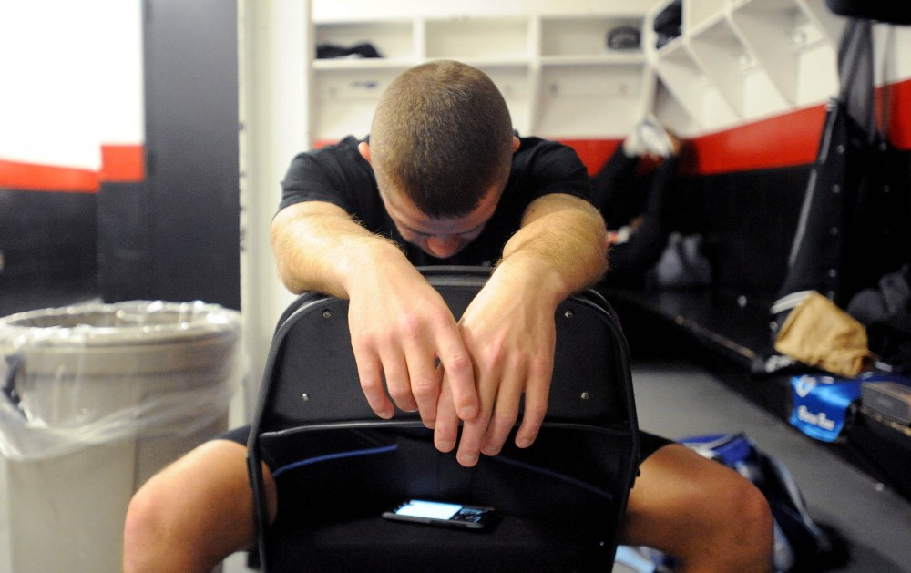 Brandon “The Cannon” Berry prepares to have his hands wrapped prior to his title bout Saturday night at the  Androscoggin Bank Colisee in Lewiston.