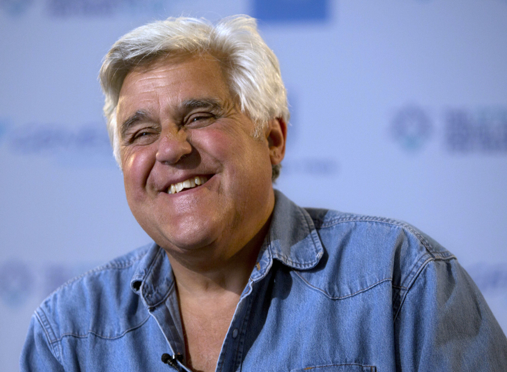 This May 21, 2014 file photo shows American comedian Jay Leno smiles during an interview with the Associated Press in Jerusalem.