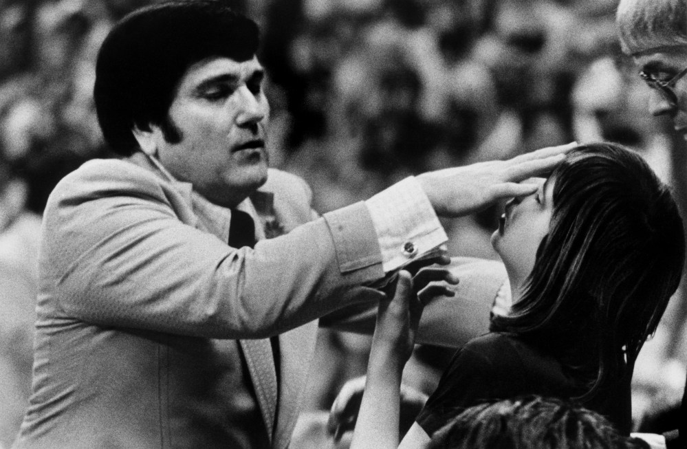 This April 12, 1976, file photo shows Reverend Ernest W. Angley, Faith Healer from Grace Cathedral, Norfolk, Va.