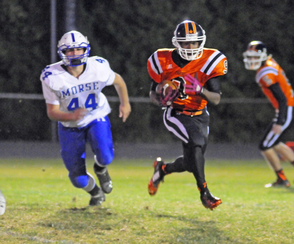 Staff file photo by Joe Phelan 
 Gardiner running back Treavon Horton gains some yards during a game against Morse earlier this season.