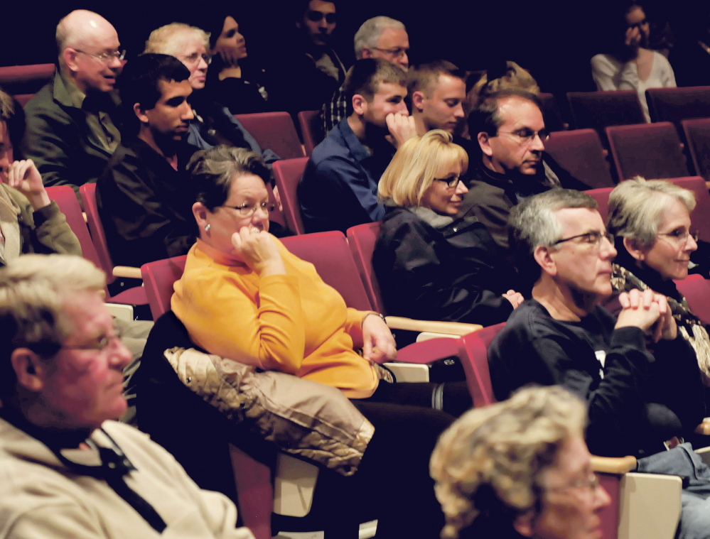 Waterville residents listen to Waterville mayor candidates Karen Rancourt-Thomas, Steve Aucoin and Nick Isgro at Thomas College in Waterville on Thursday.