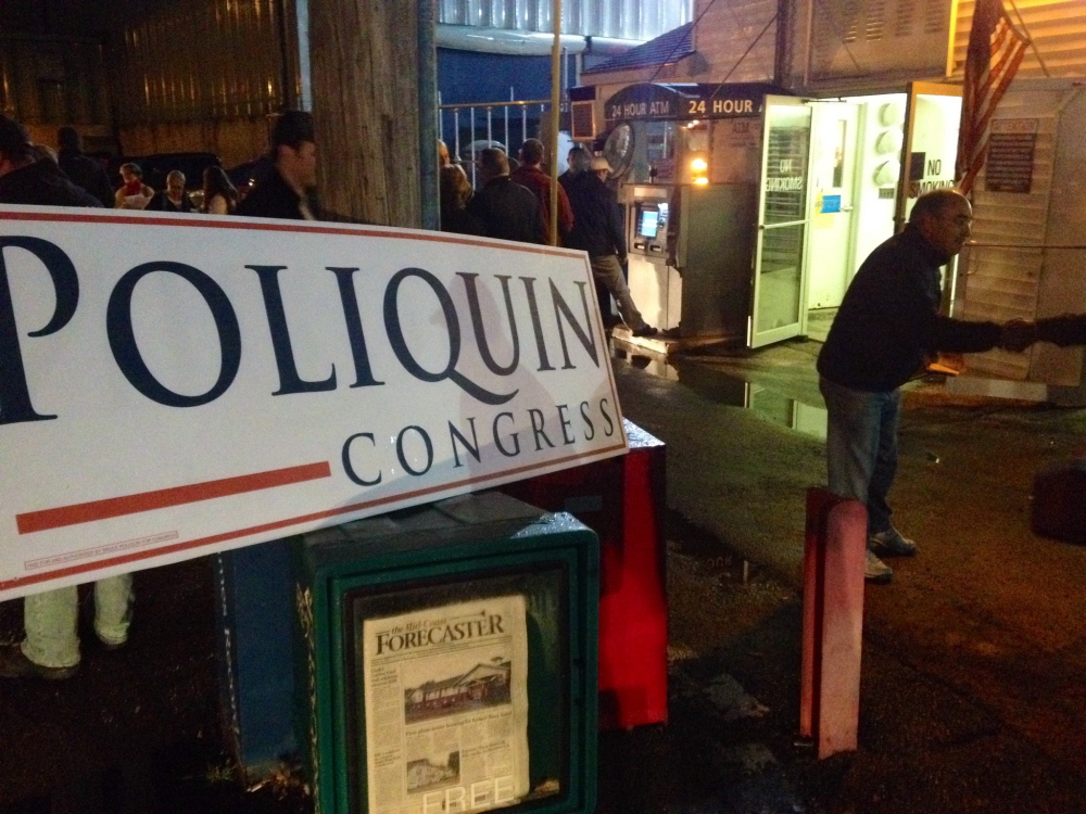 Republican 2nd Congressional District candidate Bruce Poliquin, right, shakes a worker’s hand outside Bath Iron Works early Thursday morning in Bath.