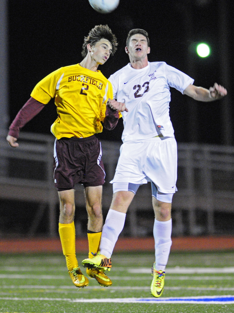 Buckfield’s Jon Randolph, left, and Richmond’s Mike Stewart go up for a header during the Western Maine Class D boys soccer final Wednesday at McMann Field in Bath.