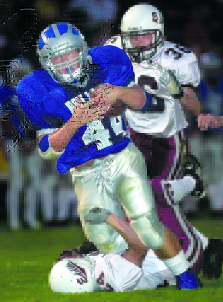 The Lawrence football team begins the playoffs this weekend, looking to capture its first state title since 2006, when the Bulldogs were led by fullback/linebacker David Wallace, left. At the time, Lawrence was only the second eastern Maine team to win a Class A state title in 27 years.