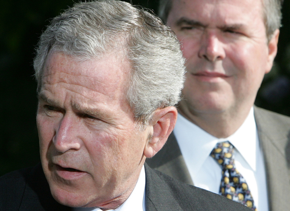 President George W. Bush, left, is giving even odds to an attempt at a family legacy as part of the 2016 White House campaign, saying Sunday on “Face the Nation” on CBS that his brother, Jeb Bush, is “wrestling with the decision.”