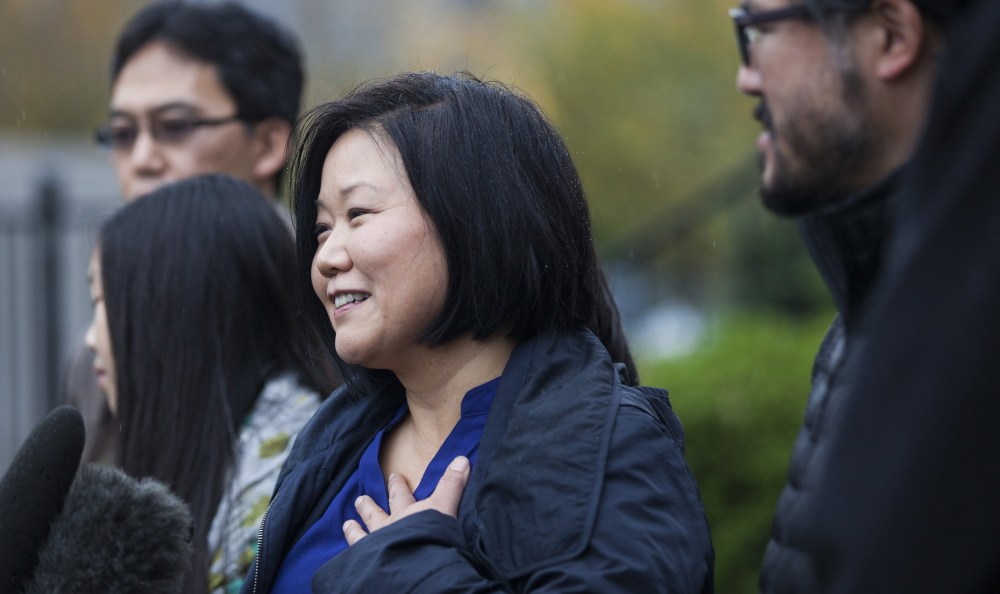 Terri Chung, sister of Kenneth Bae, answers questions from the media after attending a Sunday church service. Bae, who was a prisoner in North Korea for two years, arrived at a U.S. military base after being released with Matthew Miller.