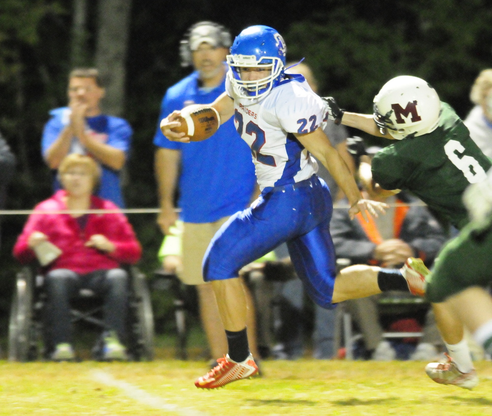 Oak Hill running back Alex Mace breaks away from Winthrop/Monmouth cornerback Nate Scott en route to a 44-yard touchdown run during a Western D Campbell Conference game this fall.