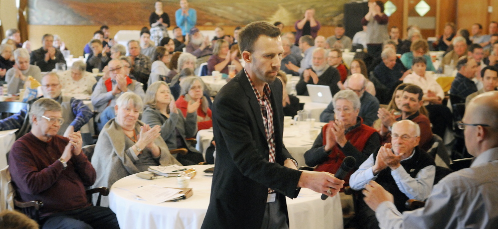Phil Bartlett, of Gorham, takes the floor to address members of the Maine Democratic Party State Committee during a meeting in Augusta on Sunday to elect a new chairman for the party. Bartlett, of Gorham, won the position by a large margin.
