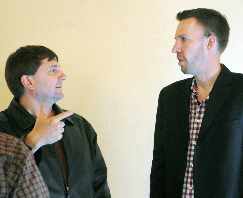 State Senator Troy Jackson, D-Allagash, left, speaks with Phil Bartlett, of Gorham, during a Maine Democratic Party meeting in Augusta on Sunday. Jackson nominated Bartlett to be the next chairman of the party.