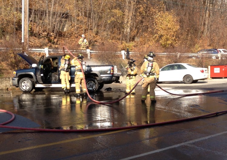 Augusta firefighters put out a blaze that began in the bed of a pickup and spread to the entire vehicle. The truck, owned by Roger Lord of Hallowell, was destroyed in the Thursday morning fire on Commercial Street in Augusta, according to Augusta Fire Department Battalion Chief Jason Farris.