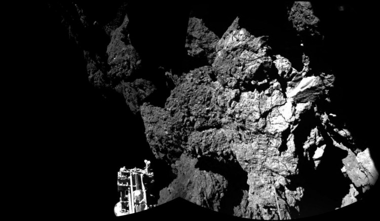 This composite image released by the European Space Agency on Thursday shows Rosetta's lander Philae on the surface of Comet 67P/Churyumov-Gerasimenko. One of the landers three feet can be seen in the foreground. The Associated Press.