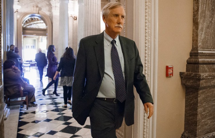 Before the Senate's vote Tuesday on the Keystone XL oil pipeline, independent Sen. Angus King of Maine leaves a strategy session of the Democratic caucus. King voted against the bill despite what he described as his frustration over President Obama's refusal to make a decision on the pipeline. 