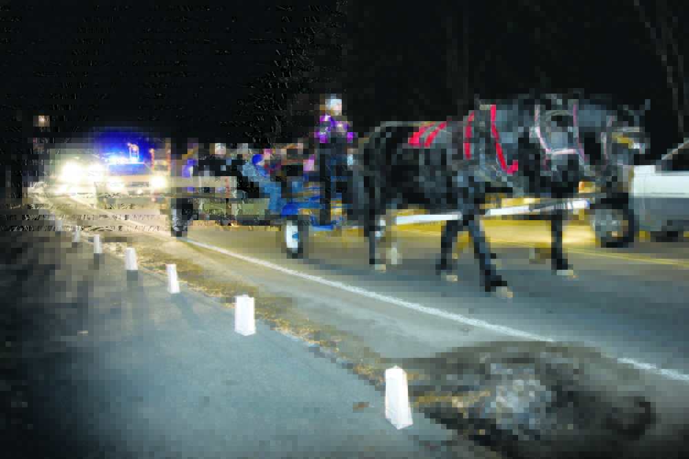Wagon rides, like this one several years ago, will be a feature at the Belgrade Village Holiday Stroll again Saturday.
