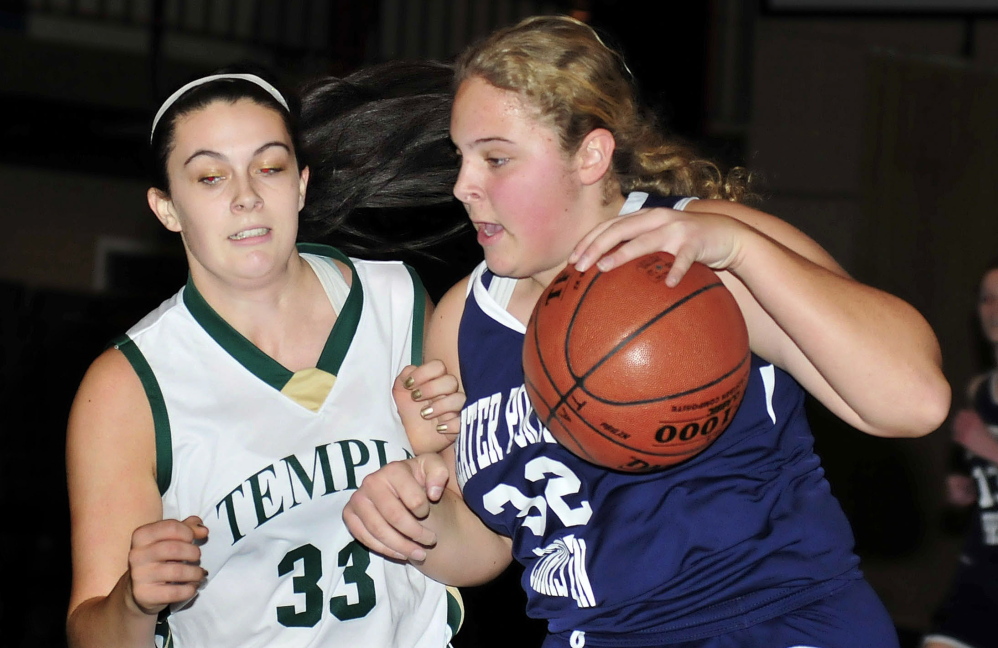 Temple Academy’s Kiara Carr moves in to defend Greater Portland Christian’s Clarissa Jones during a game Monday afternoon.