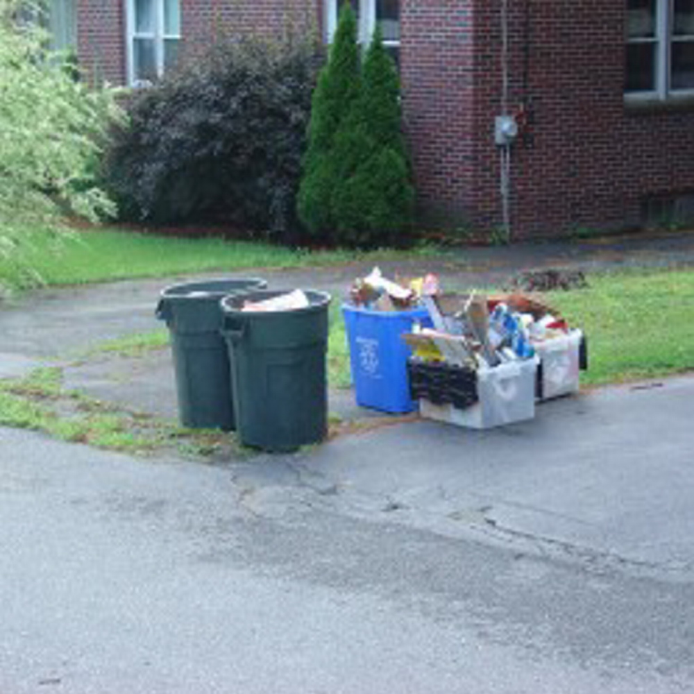 Despite enactment of Pay As You Throw, the Waterville City Code still requires that trash containers “shall be made of either plastic or metal, contain two (2) handles.”