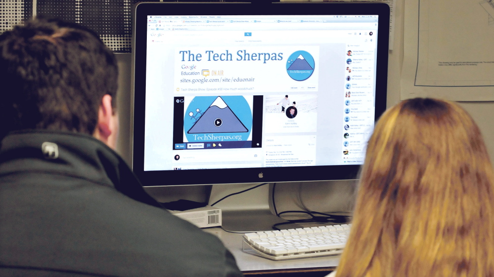 Nokomis Regional High School students Jake McEwen and Britney Bubar prepare to ask questions Dec. 15 using a Google Hangout chat site at the school in Newport.