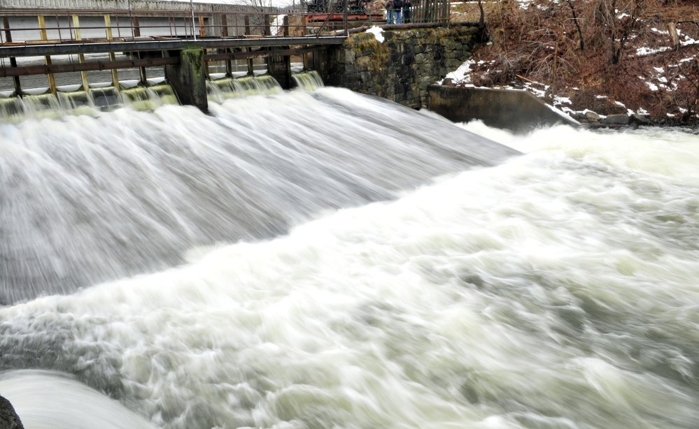 Cobbosseecontee Stream flows over the New Mills Dam on Thursday in Gardiner.
