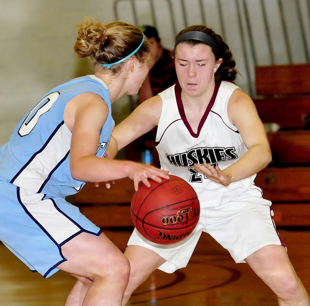 Maine Central Institute’s Allison Hughes, right,  pressures Oceanside’s Payton Billingsley during a game in Pittsfield on Monday.