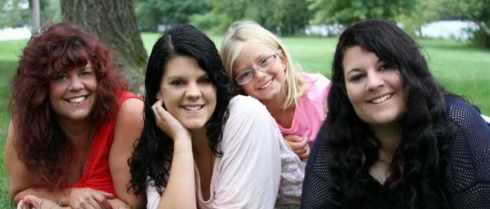 From left, Clarissa Belanger and her daughters, Sky, Kay and Tes, lived in the home at 952 Hinckley Road. Not pictured is the girls’ father, Donald Belanger.