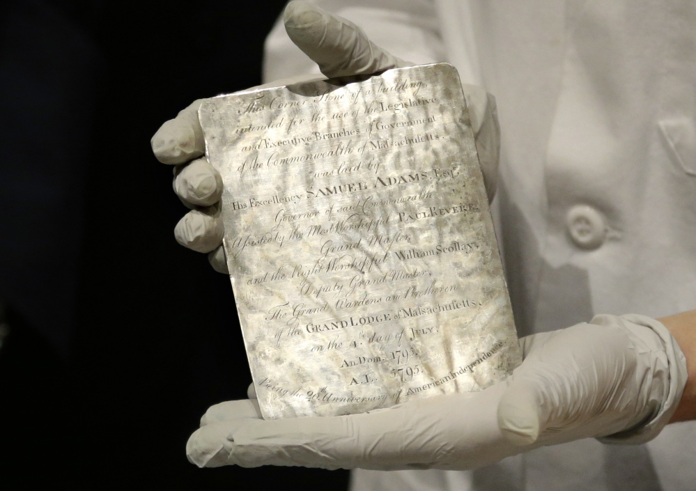 A silver plaque removed from the Massachusetts Statehouse time capsule.