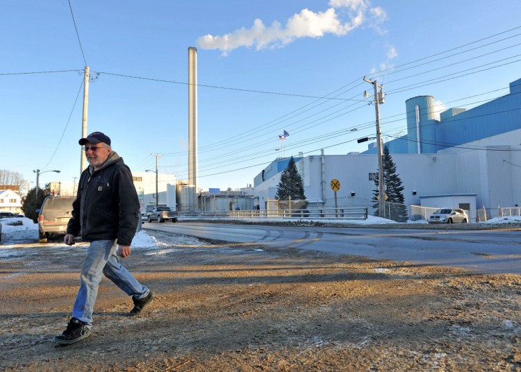 Staff photo by Michael G. Seamans
Mike Derocle, 55, a Madison Paper employee for 33 years, leaves work Tuesday. Derocle said the temporary layoff at the plant is “just part of life.”