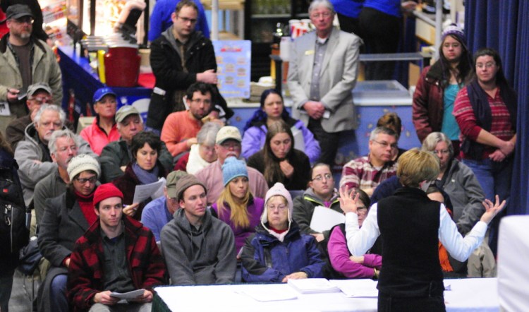 A standing-room-only audience listens to Ronda Stone give a talk on Wednesday about how to use a home kitchen commercially at the 74th Annual Agricultural Trades Show at Augusta Civic Center.